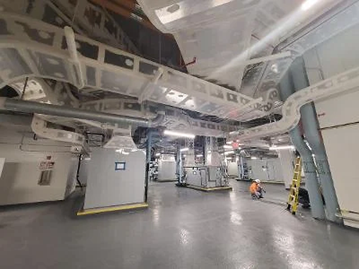 Air handling equipment and overhead ductwork in a mechanical room