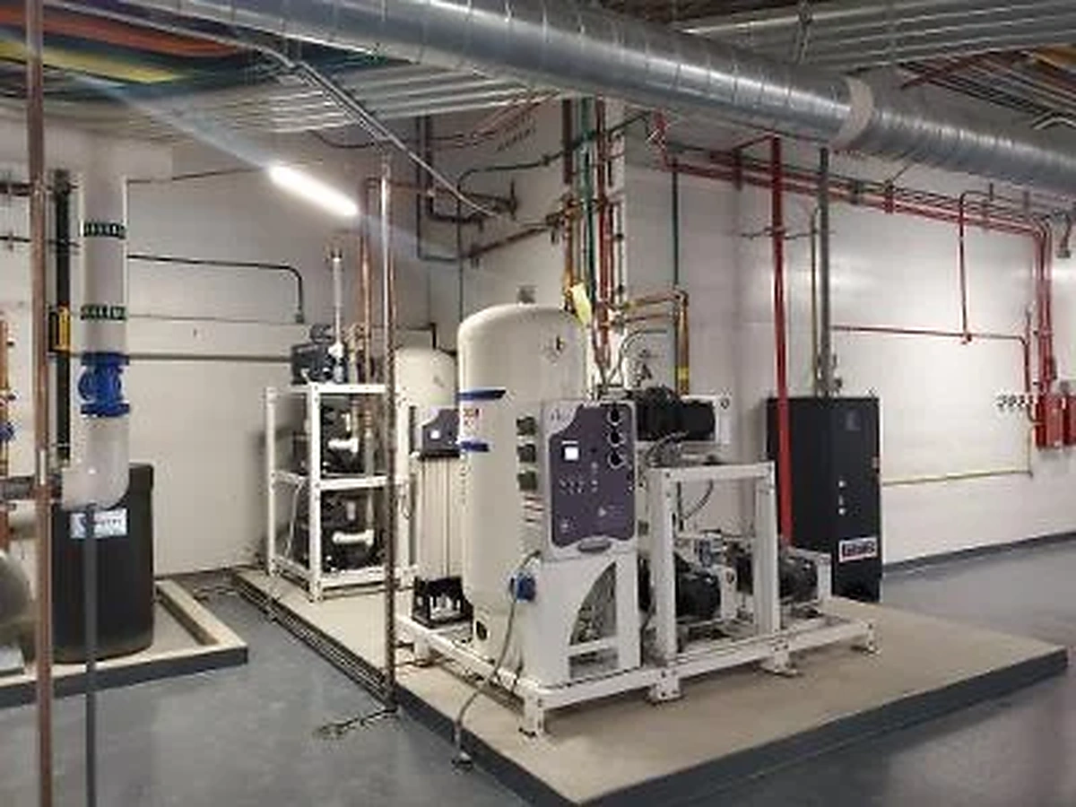 Air handling equipment and overhead ductwork in a mechanical room